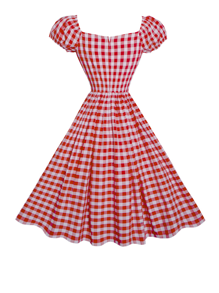 Red and white checkered dress on a white background